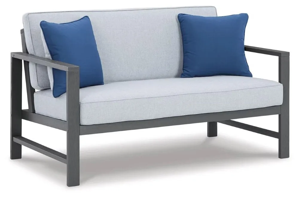 Ashley Furniture Fynnegan Nuvella Outdoor Loveseat with Coffee Table
